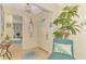 Welcoming foyer with stylish decor, a mirror, and a view into the adjacent living space at 4091 Center Pointe Pl # 40A, Sarasota, FL 34233