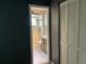 Bathroom view showing tile floors, shower, sink and storage next to the entrance to a bedroom at 5013 Village Gardens Dr # 34, Sarasota, FL 34234