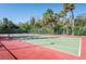 Community tennis court featuring a well-maintained green surface, perfect for tennis enthusiasts at 5013 Village Gardens Dr # 34, Sarasota, FL 34234