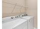 Convenient laundry room features modern washer and dryer at 507 W Cashew, Punta Gorda, FL 33955