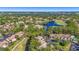 Breathtaking aerial perspective of the condo community near the golf course and lakes, offering a peaceful living environment at 5275 Willow Links # 50, Sarasota, FL 34235