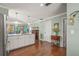 Open kitchen layout with a marble island flowing into the dining and living area at 5275 Willow Links # 50, Sarasota, FL 34235