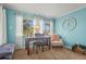 Bright home office featuring a functional desk, a comfortable chair, and natural light at 5275 Willow Links # 50, Sarasota, FL 34235