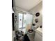 Modern bathroom with glass enclosed shower, granite design and marbled tile at 5378 Royal Palm Ave # 5378, Sarasota, FL 34234