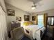Cozy bedroom with natural light, ceiling fan, neutral paint, and comfortable seating at 5378 Royal Palm Ave # 5378, Sarasota, FL 34234