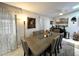 Dining room with bright lighting, a stylish table, and seating for eight, ideal for entertaining at 5378 Royal Palm Ave # 5378, Sarasota, FL 34234