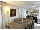 The dining room is well-lit with a modern table, perfect for Gathering meals or hosting dinner parties at 5378 Royal Palm Ave # 5378, Sarasota, FL 34234