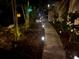 Landscaped pathway with illuminated lighting for evening appeal at 5378 Royal Palm Ave # 5378, Sarasota, FL 34234