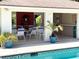Inviting community pool with covered seating area offers a perfect spot for relaxation and socializing at 5378 Royal Palm Ave # 5378, Sarasota, FL 34234