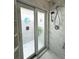 Modern shower with marble-style tile and glass enclosure at 5378 Royal Palm Ave # 5378, Sarasota, FL 34234