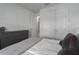 Bedroom featuring a dresser, plush bedding, and natural light at 5621 Badini Way, Palmetto, FL 34221