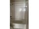 Clean bathroom bathtub with shower head and white tile surround at 5681 Bentgrass Dr # 13-201, Sarasota, FL 34235