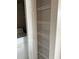 A well-organized pantry with multiple wire shelves, providing ample storage space at 5681 Bentgrass Dr # 13-201, Sarasota, FL 34235