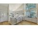 Bright kitchen featuring modern cabinetry, sleek countertops, stainless steel appliances and high ceilings at 5688 Pipers Waite # 50, Sarasota, FL 34235