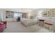 Spacious main bedroom with built-in bookshelves, creating a cozy and inviting atmosphere at 5688 Pipers Waite # 50, Sarasota, FL 34235