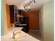 Modern kitchen with stainless steel appliances, ample counter space, and track lighting at 5691 Bentgrass Dr # 15-102, Sarasota, FL 34235