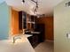 Well-lit kitchen featuring modern appliances, and ample counter space at 5691 Bentgrass Dr # 15-102, Sarasota, FL 34235
