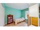 This bedroom features laminate flooring, closet, and light natural light at 6342 7Th W Ave # 6342, Bradenton, FL 34209