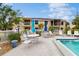 Relaxing poolside seating area perfect for enjoying sunny days and community gathering at 6342 7Th W Ave # 6342, Bradenton, FL 34209