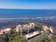 Aerial view of waterfront condo community with boat access and beautiful landscape at 6460 Mourning Dove Dr # 204, Bradenton, FL 34210