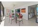 Inviting sunroom with tile floors and views of the ocean, perfect for relaxing or entertaining at 6460 Mourning Dove Dr # 204, Bradenton, FL 34210