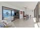 Spacious sunroom with waterfront views, casual seating and lots of natural light at 6460 Mourning Dove Dr # 204, Bradenton, FL 34210