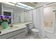 Bright bathroom featuring a shower and tub combo and a clean, well-maintained look at 6460 Mourning Dove Dr # 204, Bradenton, FL 34210