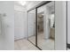 Hallway view with full closet access and leads to bathroom at 6460 Mourning Dove Dr # 204, Bradenton, FL 34210