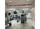 Modern gym with cardio equipment, weights, and a motivational quote at 6505 Stone River Rd # 306, Bradenton, FL 34203