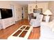 Inviting living room features bright natural light, comfortable seating, and a classic coastal decor at 6505 Stone River Rd # 306, Bradenton, FL 34203