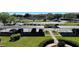 Convenient covered parking area for residents, surrounded by lush greenery at 6505 Stone River Rd # 306, Bradenton, FL 34203