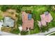 Aerial view of a home featuring a screened-in pool and a backyard playground at 6637 Taeda Dr, Sarasota, FL 34241