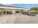 Outdoor golf cart parking lot with covered area and multiple carts at 6637 Taeda Dr, Sarasota, FL 34241