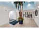 Inviting lobby with tile flooring, a decorative potted palm tree, and access to the pro shop at 6637 Taeda Dr, Sarasota, FL 34241