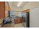 Kitchen features stainless steel appliances and granite counters at 7015 River Hammock Dr # 204, Bradenton, FL 34212