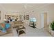 Living room with tile floors and an open floor plan at 7015 River Hammock Dr # 204, Bradenton, FL 34212
