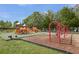 Fun playground area with slides, swings, and climbing structures for enjoyment at 7015 River Hammock Dr # 204, Bradenton, FL 34212