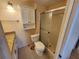 Bathroom featuring toilet, vanity and standing shower at 808 53Rd E Ave # 273, Bradenton, FL 34203