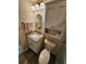 Bathroom features a granite vanity, a decorative mirror and a walk-in shower at 808 53Rd E Ave # 273, Bradenton, FL 34203