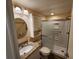 Bathroom featuring a vanity with a granite countertop and a walk-in shower at 808 53Rd E Ave # 273, Bradenton, FL 34203