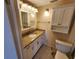 Bathroom with a granite countertop and white cabinets at 808 53Rd E Ave # 273, Bradenton, FL 34203