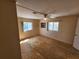 A bedroom with plywood flooring and a ceiling fan at 808 53Rd E Ave # 273, Bradenton, FL 34203