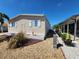 Side view of a cozy one-story home with manicured landscaping and easy access to neighborhood amenities at 808 53Rd E Ave # 273, Bradenton, FL 34203