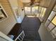 Enclosed Florida room providing a versatile space with sliding windows for outdoor views and natural light at 808 53Rd E Ave # 273, Bradenton, FL 34203