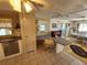 Cozy kitchen featuring an eat-in desk area and view of the adjacent dining room at 808 53Rd E Ave # 273, Bradenton, FL 34203