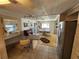Kitchen with eat-in desk area and access to the dining room, perfect for entertaining at 808 53Rd E Ave # 273, Bradenton, FL 34203