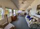Bright sunroom filled with natural light, features comfortable seating, dining area, and lovely views, creating an inviting space at 808 53Rd E Ave # 273, Bradenton, FL 34203