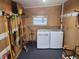 Utility room with new washer and dryer, ample space for cleaning and storage and lots of wall hooks at 808 53Rd E Ave # 273, Bradenton, FL 34203