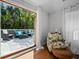 Sitting area with slider doors to balcony and outside seating area at 813 Hudson Ave, Sarasota, FL 34236