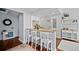 Kitchen island with white cabinets, granite counter, and stools at 813 Hudson Ave, Sarasota, FL 34236
